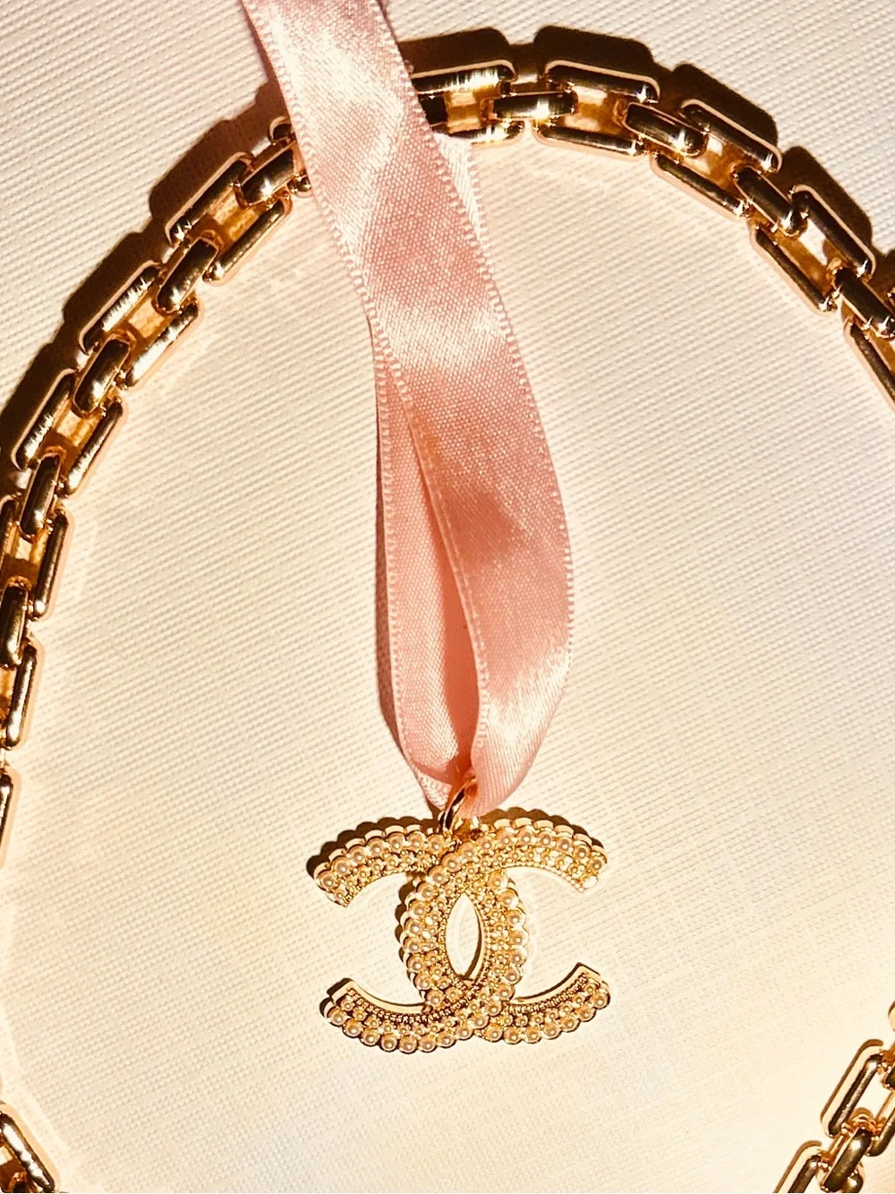 CHANEL Gold CC Pendant with Pink Ribbon New Elegant Chain